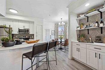 Built-in wet bar and shelving in select homes